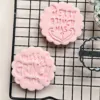 20250918_131738 Close-up of Grumpy Christmas funny festive cookie stamp and fondant embosser impression on fondant