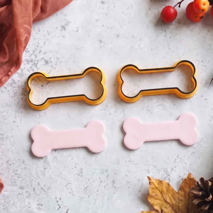 Halloween bone cookie cutter with bone-shaped fondant decoration (2) Halloween Bone Cookie Cutter | Skeleton Fondant & Biscuit Cutter