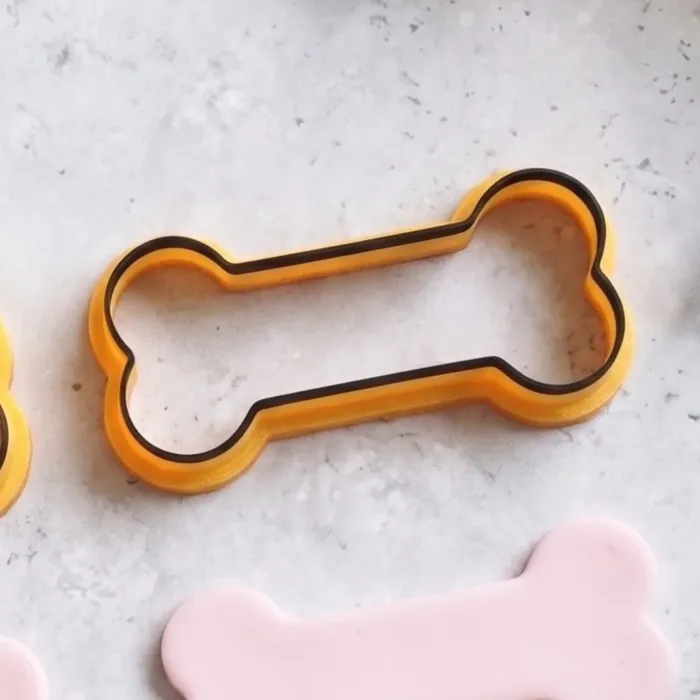 Halloween bone cookie cutter with bone-shaped fondant decoration (3) Halloween Bone Cookie Cutter | Skeleton Fondant & Biscuit Cutter