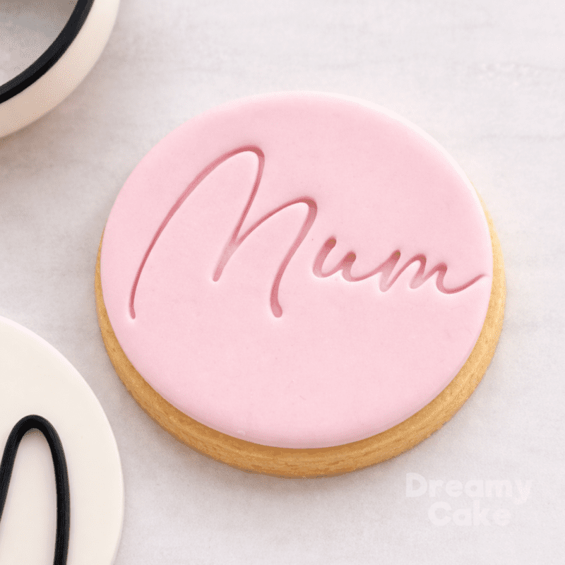 Happy Mother’s Day cookie stamp embossed on pink fondant biscuit