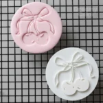 Cherry bow fondant cookie with embossed cherries and bow on pink icing – Dreamy Cake stamp
