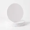 10-inch-round-cake-board-01.jpg (4) White 12 inch round cake drum board photographed from above