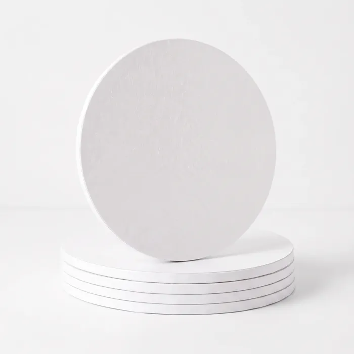 10-inch-round-cake-board-01.jpg (4) White 12 inch round cake drum board photographed from above